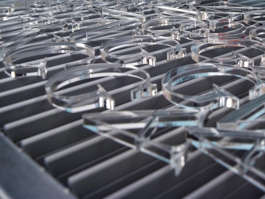 Three-dimensional letters cut with a CO2 laser